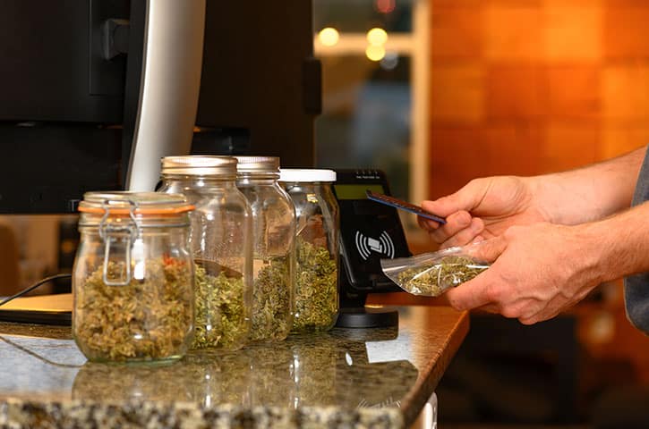 POS system being used to purchase cannabis